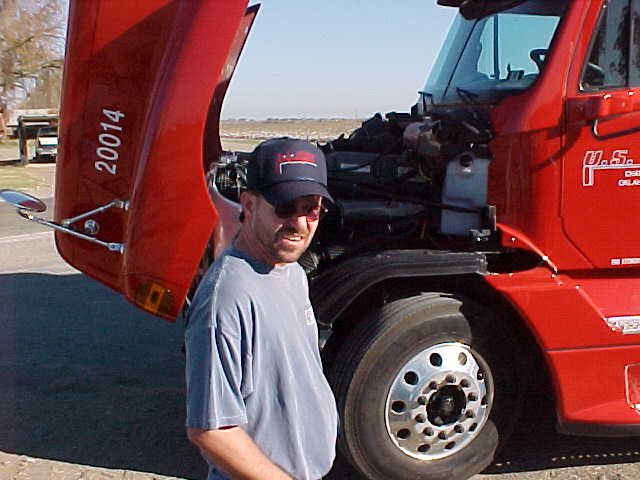 Roger Checking Under The Hood